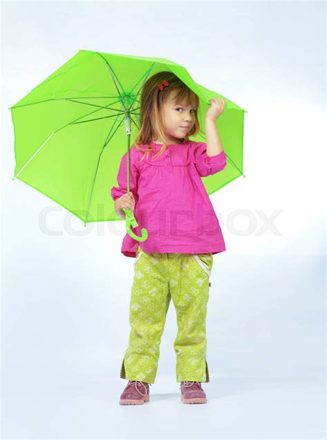 Portrait of lovely fashion child with umbrella | Stock image | Colourbox