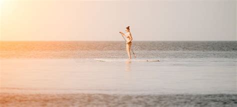 Woman In Rainbow Bikini Happy Tanned Well Looking Middle Aged W Stock Photo Image Of Blue