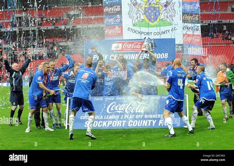 Stockport County Players Celebrate After Winning The League Two Play