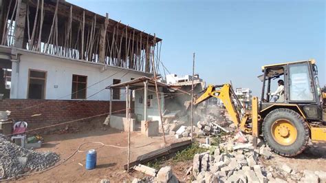 నస్పూర్‌లో అక్రమ కట్టడాల కూల్చివేత Demolition Of Illegal Structures In Naspur