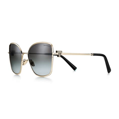 Tiffany T Sunglasses In Pale Gold Colored Metal With Gray Gradient Lenses Tiffany And Co Ca