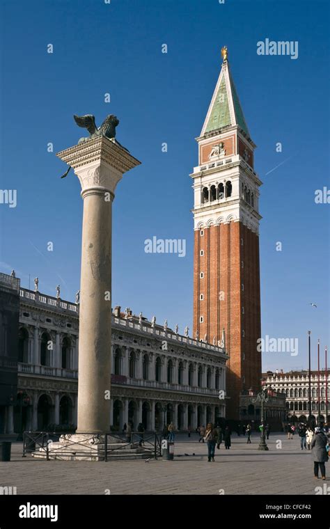 Campanile Bell Tower And Winged Lion Column At Saint Mark S Square