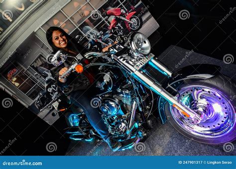 Woman Rider Sitting On Her Bike In The City Of Sturgis In South Dakota