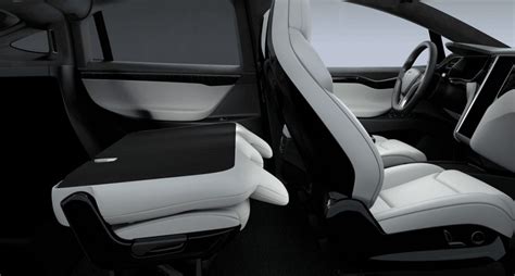 Tesla Updates Model X Seater With Fold Flat Second Row Seating