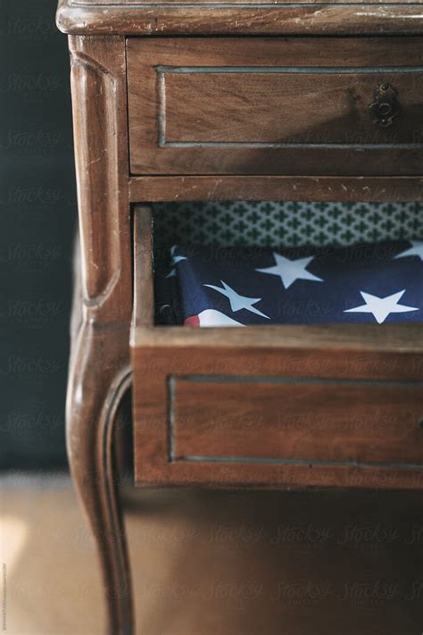 American Flag Inside Drawer On Wood Side Table By Stocksy