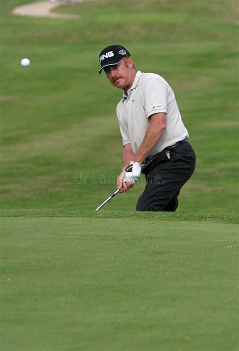 Spanish Golfer Miguel Angel Jimenez Hitiing the Ball Editorial Image ...