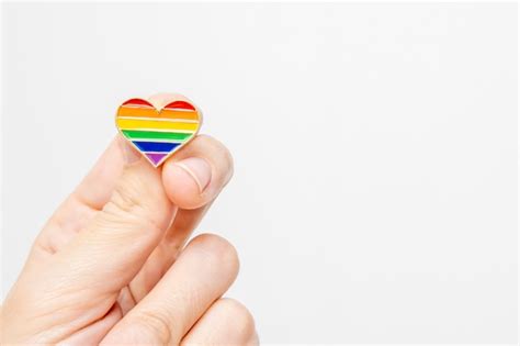 Premium Photo Hand Holding Rainbow Gay Pride Symbol Heart As Lgbt Rights Concept Copy Space