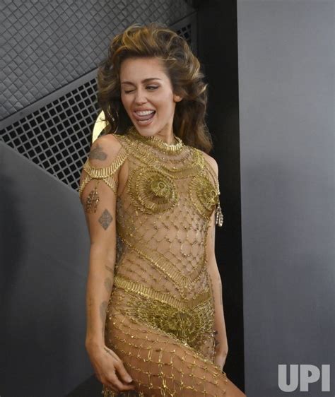 Photo: Miley Cyrus Attends the 66th Grammy Awards in Los Angeles ...