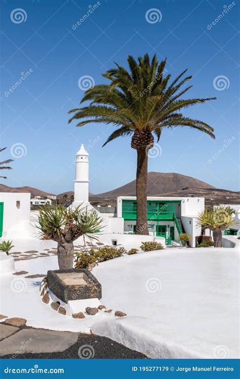 Typical Canarian Style Buildings And Tropical Plants El Campesino