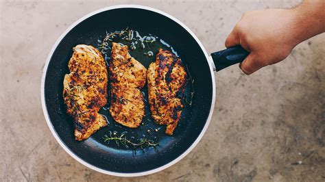 Pan Fried Chicken In Olive Oil With Tomato Pecan Persimmon Succotash