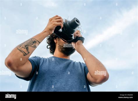 camera lens tattoo