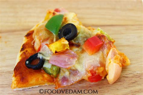 Cheesy Veg Pizza Recipe Basic Vegetarian Pizza Foodvedam