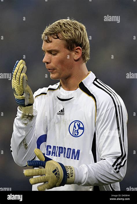 Schalke S Goal Keeper Manuel Neuer Spits Into His Gloves During