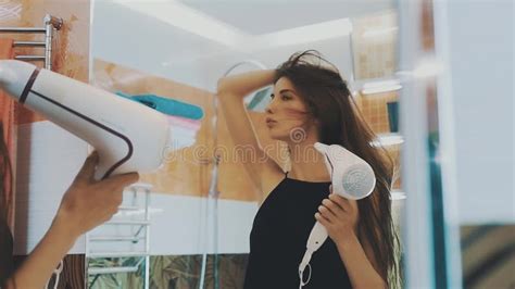 Brunette Young Girl Taking Bath Full Of Foam In Bathroom Bathtub