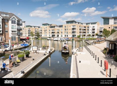 A narrowboat entering Brentford Gauging Locks on the River Brent ...