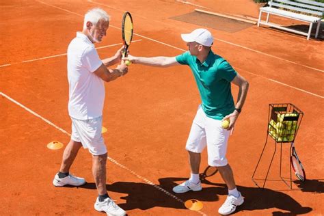 Senior Man Playing Tennis Stock Photo By Microgen 115174248