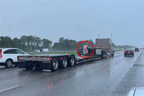 Naked Florida Man Climbs Onto Big Rig On Busy Highway