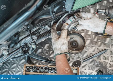 Motorcycle Mechanic Check The Condition Of Auto Transmission System Or