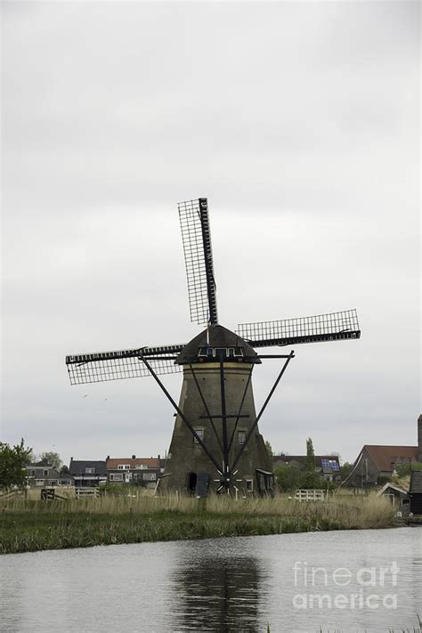 Windmill Tail Pole At Kinderdijk Photograph By Teresa Mucha