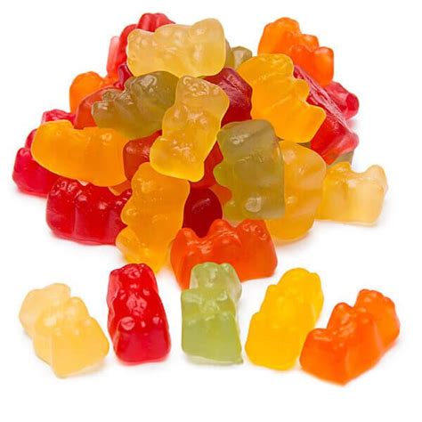 A Pile Of Gummy Bears Sitting On Top Of Each Other