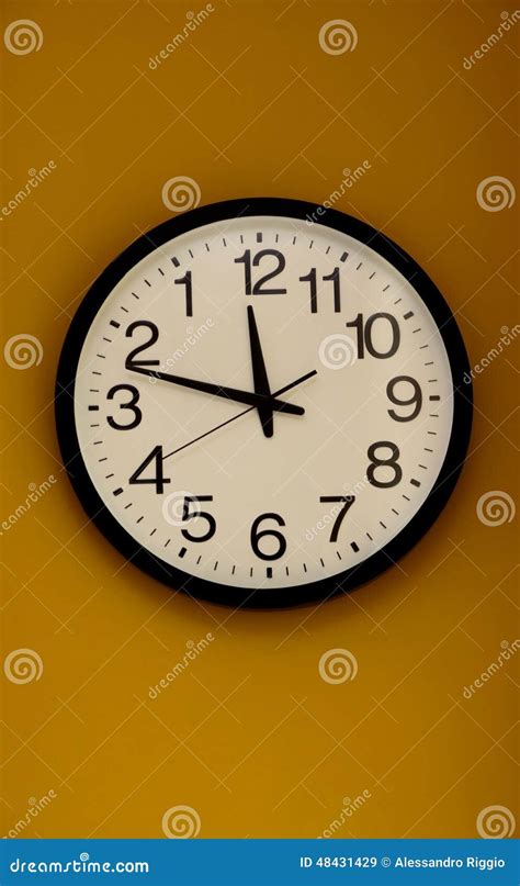 Wall Clock With The Order Of The Numbers Inverted Stock Image Image