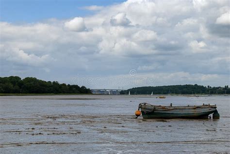 Boats Stranded By Low Tide On The River Orwell At Pin Mill Stock Photo