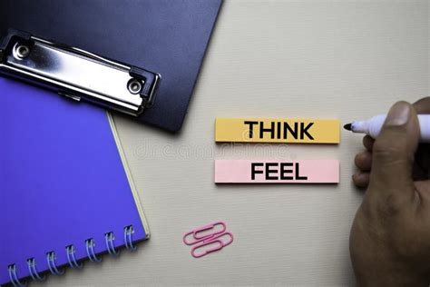 Think Or Feel Text On Sticky Notes With Office Desk Concept Stock Photo