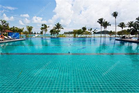 Resort swimming pool — Stock Photo © ymgerman #73258217