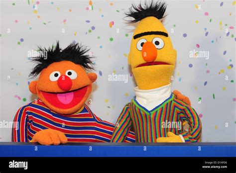 Sesame Street Muppets Ernie and Bert pose for photographs during a ...