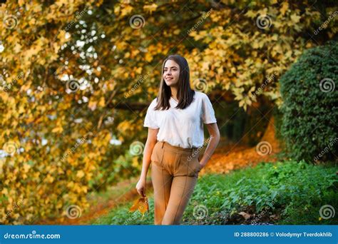 Autumn Woman With Fall Yellow Maple Leaf Outdoor Portrait Beautiful