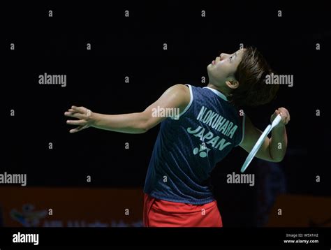 Nozomi Okuhara Of Japan Returns A Shot To Chen Yufei Of China In The