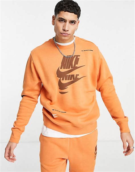 Nike Sport Essentials Multi Futura Logo Fleece Tracksuit In Orange Asos