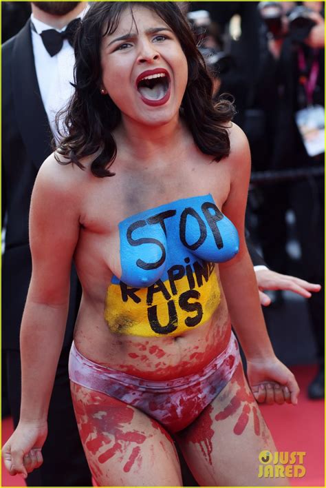 Topless Protester Storms The Red Carpet At Cannes 2022 Premiere See