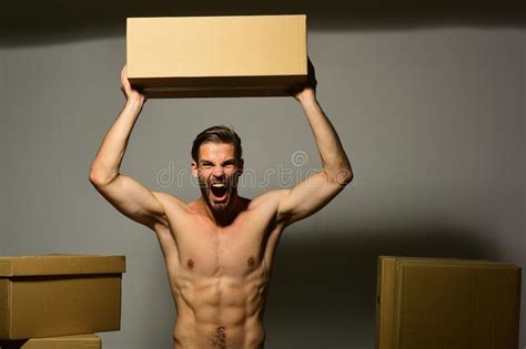 Guy With Naked Torso Holds Box Above Head Stock Image Image Of Hair Copy 201350253