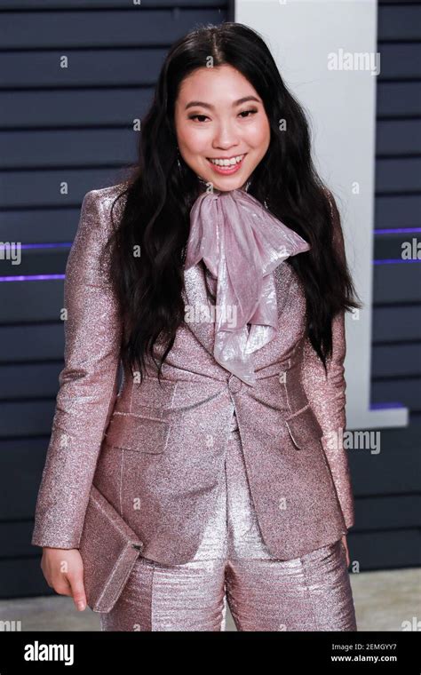 Awkwafina Walking On The Red Carpet At The 2019 Vanity Fair Oscar Party