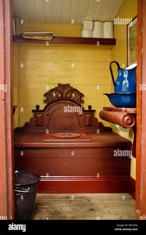 Interior of outhouse Stock Photo - Alamy