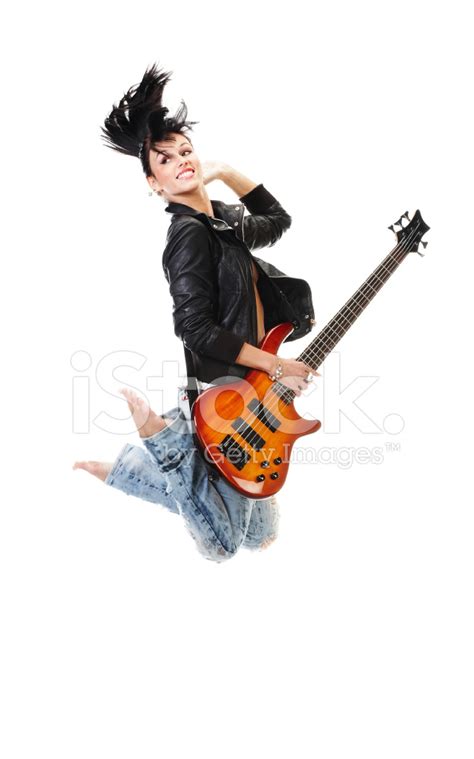 Beautiful Rock N Roll Girl Jumping With Guitar Stock Photos ...