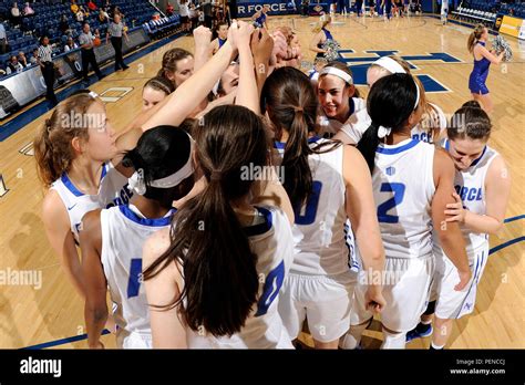 The Us Air Force Academy Womens Basketball Team Huddles Up Before