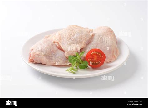 raw chicken thighs Stock Photo - Alamy