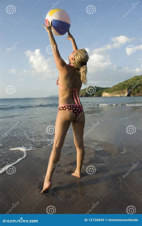 Woman In Bikini Playing With Beachball On Beach Stock Image Image Of