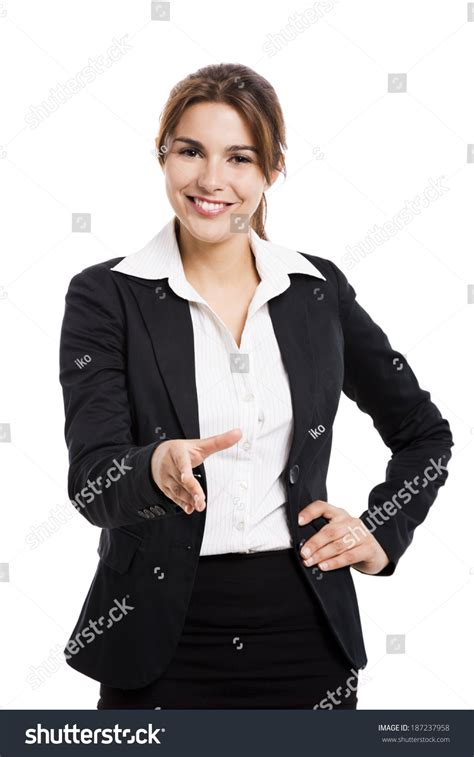 Beautiful Hispanic Business Woman Giving Handshake Stock Photo