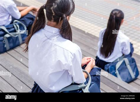 Junior High School Students Sitting On The Stairs Stock Photo Alamy