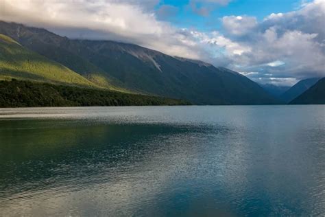 Scenic View Of Rotoiti Lake Surrounded By Mountains In Nelson Lakes