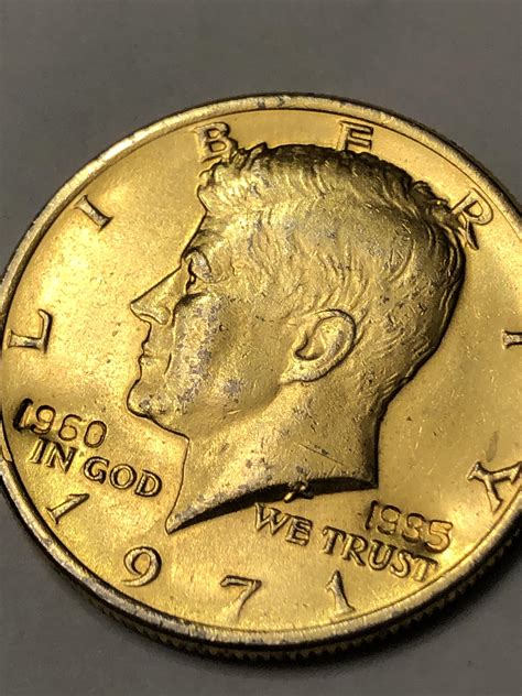 Possibly gold plated Kennedy half dollar? : r/coins