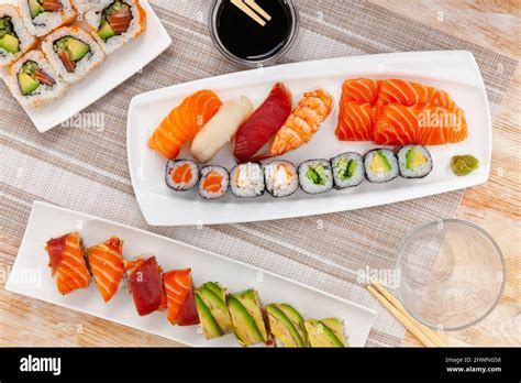 Different Types Of Sushi And Sashimi On Table Stock Photo Alamy