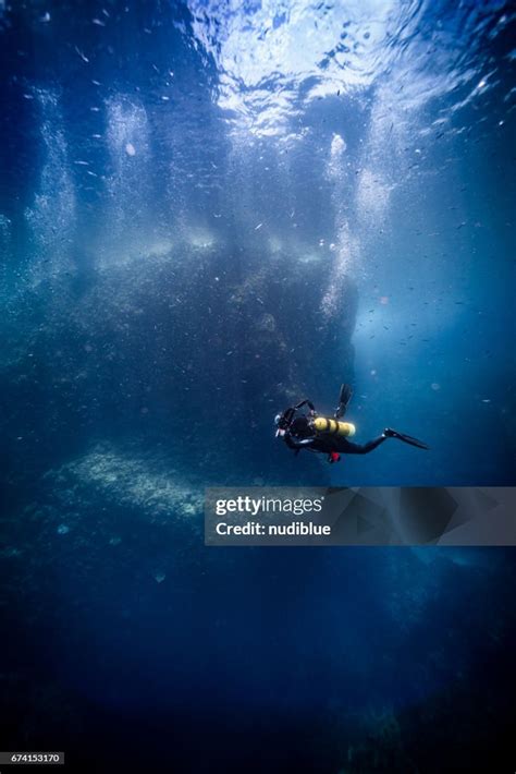 Swimming Underwater High-Res Stock Photo - Getty Images