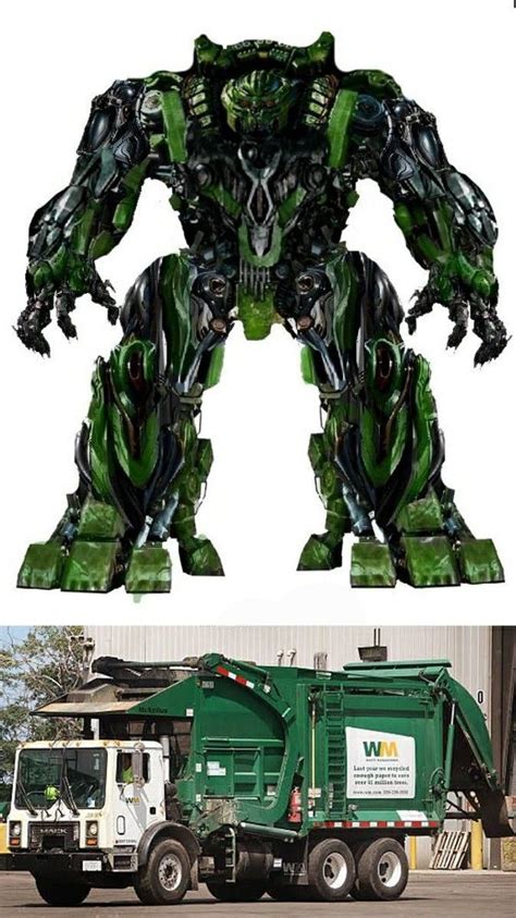 A Green And Black Truck Next To A Large Robot