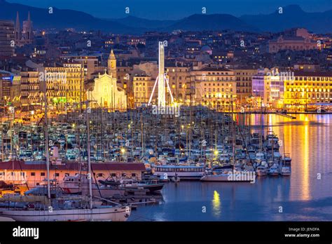 Vieux Port And Notre Dame De La Garde By Night Hi Res Stock Photography