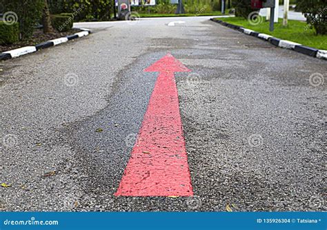 Road Markings in the Form of a Red Arrow on the Roadway for Car Drivers ...