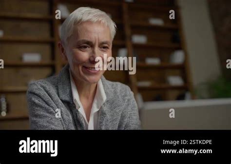 Smiling Mature Woman Short Gray Stock Videos Footage Hd And K Video Clips Alamy